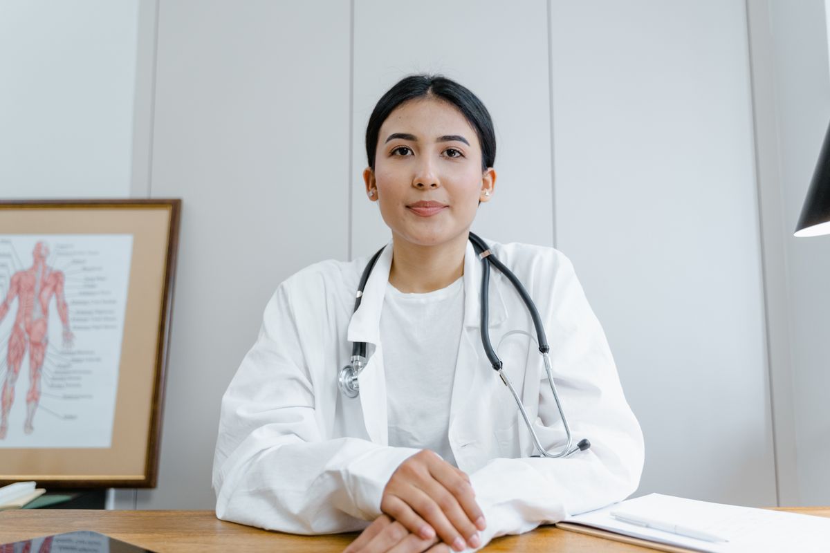 Doctors collaborating while reviewing a patient's care plan
